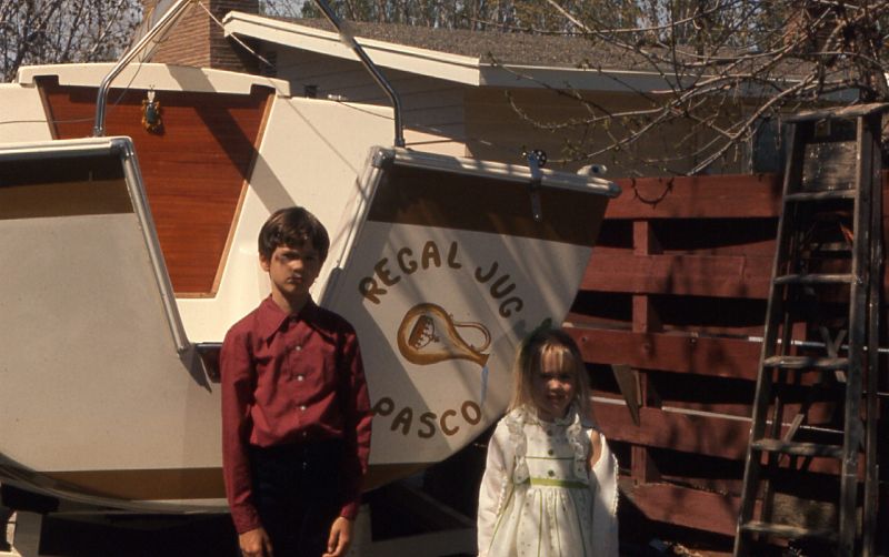 Glen and Renee Showcase the Name of our Neew Boat- April of 1974
